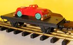 P.M.P. Wagon plateforme � essieux, chargee d'une voiture (Torpedo).